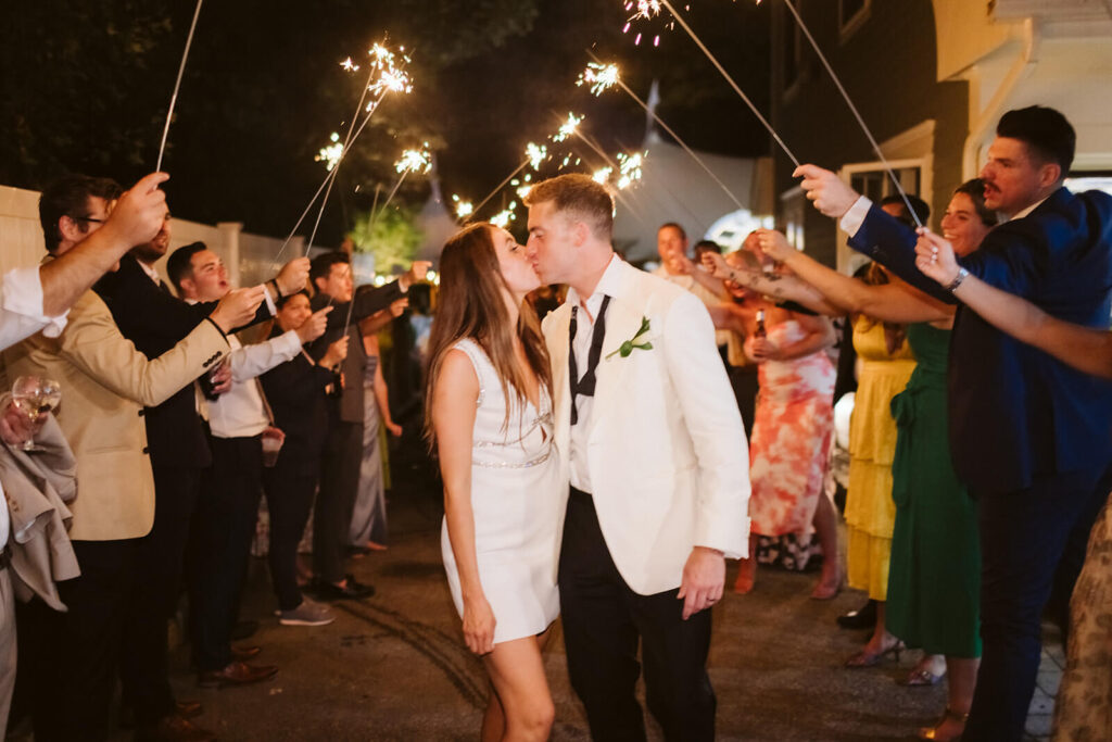 Sparkler send off after a wedding in the bride's parents' backyard in Mahwah, NJ. Photo by OkCrowe Photography. 
