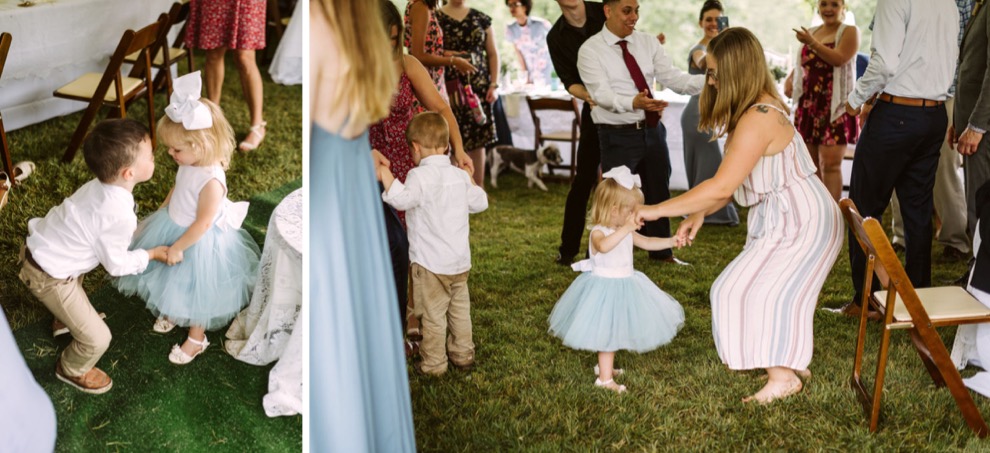 guests dancing on grass under large, white tent