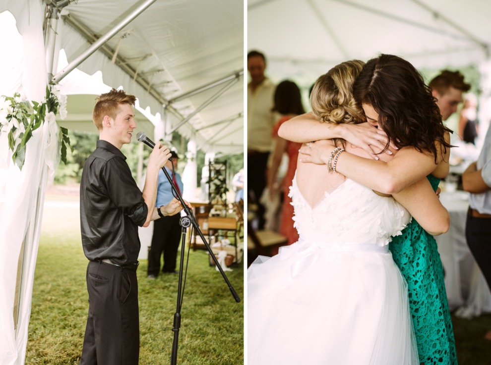 Bride hugging wedding guest under backyard wedding tent