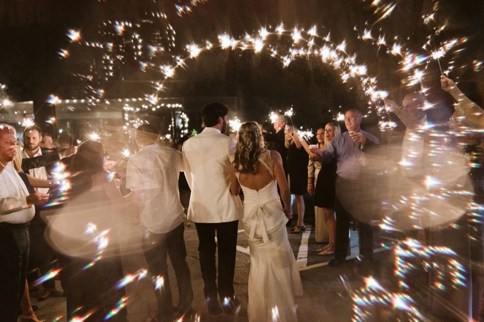 bride and groom nighttime sparkler exit