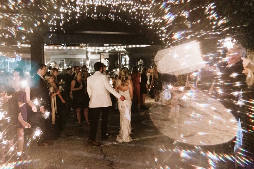 bride and groom nighttime sparkler exit