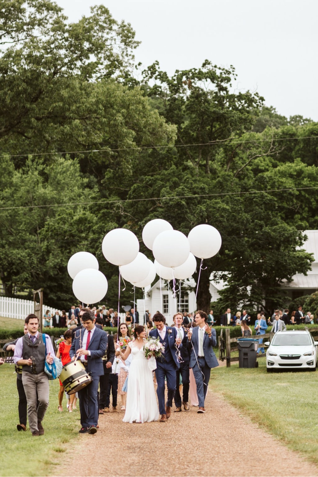 Balloon parade to wedding reception