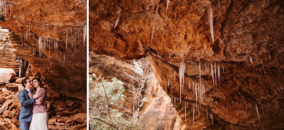 Bride and groom pose under red cliffs with icicles around them.