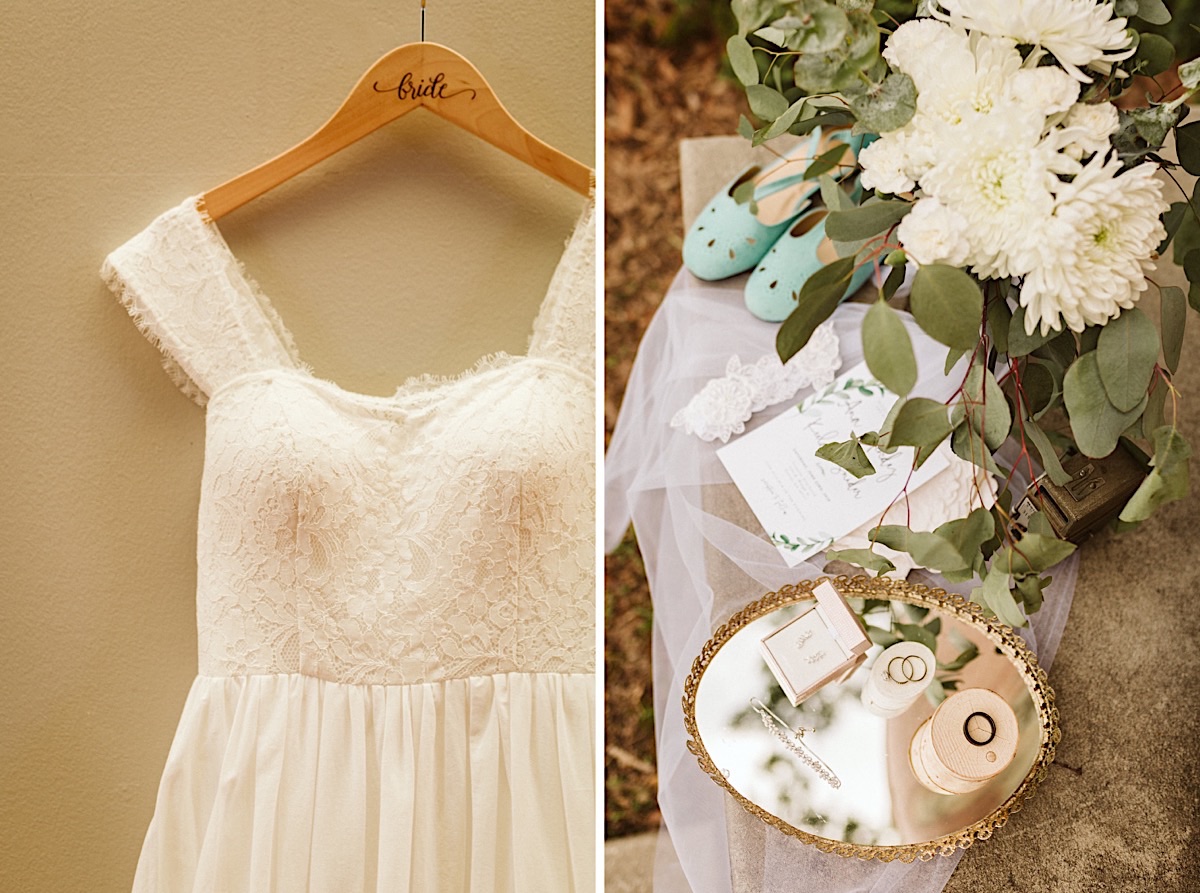 Bride's gown on a hanger labeled "bride" hangs on a cream colored wall.