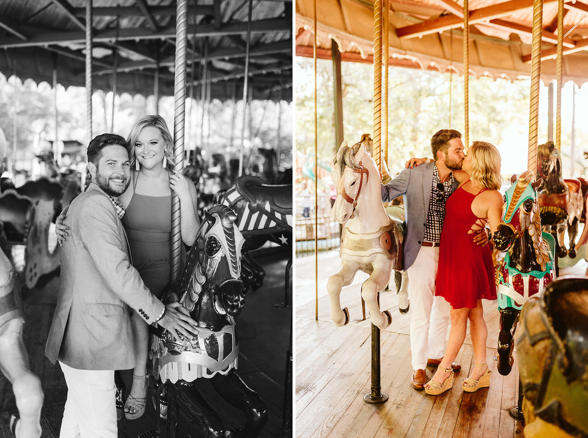 Man and woman stand between horses on the carousel at Lake Winnie in Chattanooga for their cute engagement photo session