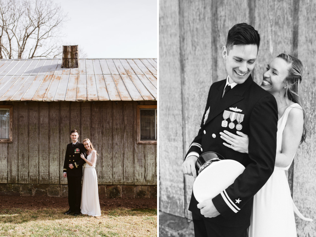 Bride and groom cuddle arm-in-arm in front of antique family cabin after their intimate elopement