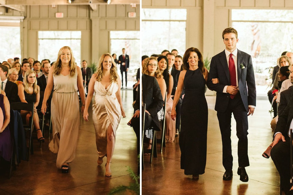 Two bridesemaids in champagne gowns walking down the aisle during Lookout Mountain wedding in open-air pavilion