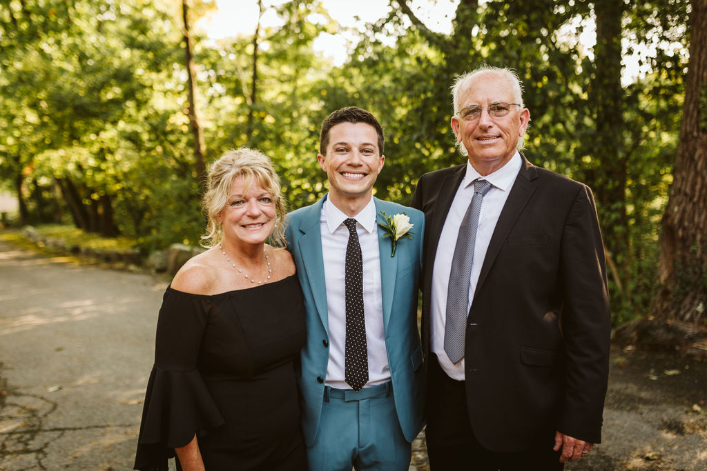 Groom smiling with grandparents after Lookout Mountain wedding ceremony in Chattanooga, Tennessee