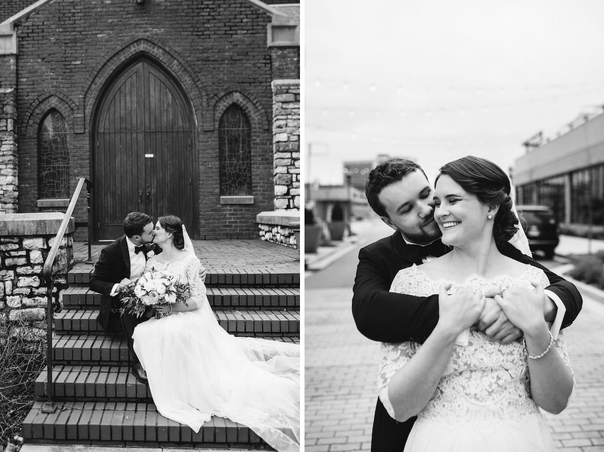 Bride and groom kiss while sitting on brick steps. She wears a white lace bodice gown
