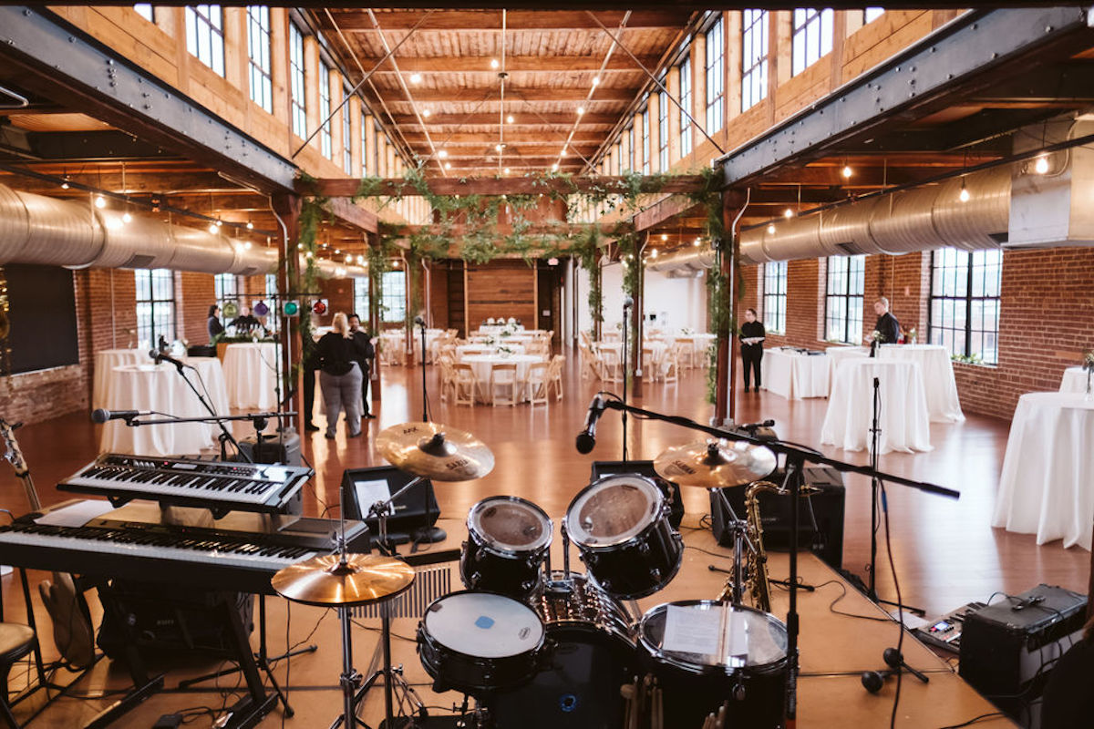 Live band musical equipment on the stage at The Turnbull Building's wedding hall