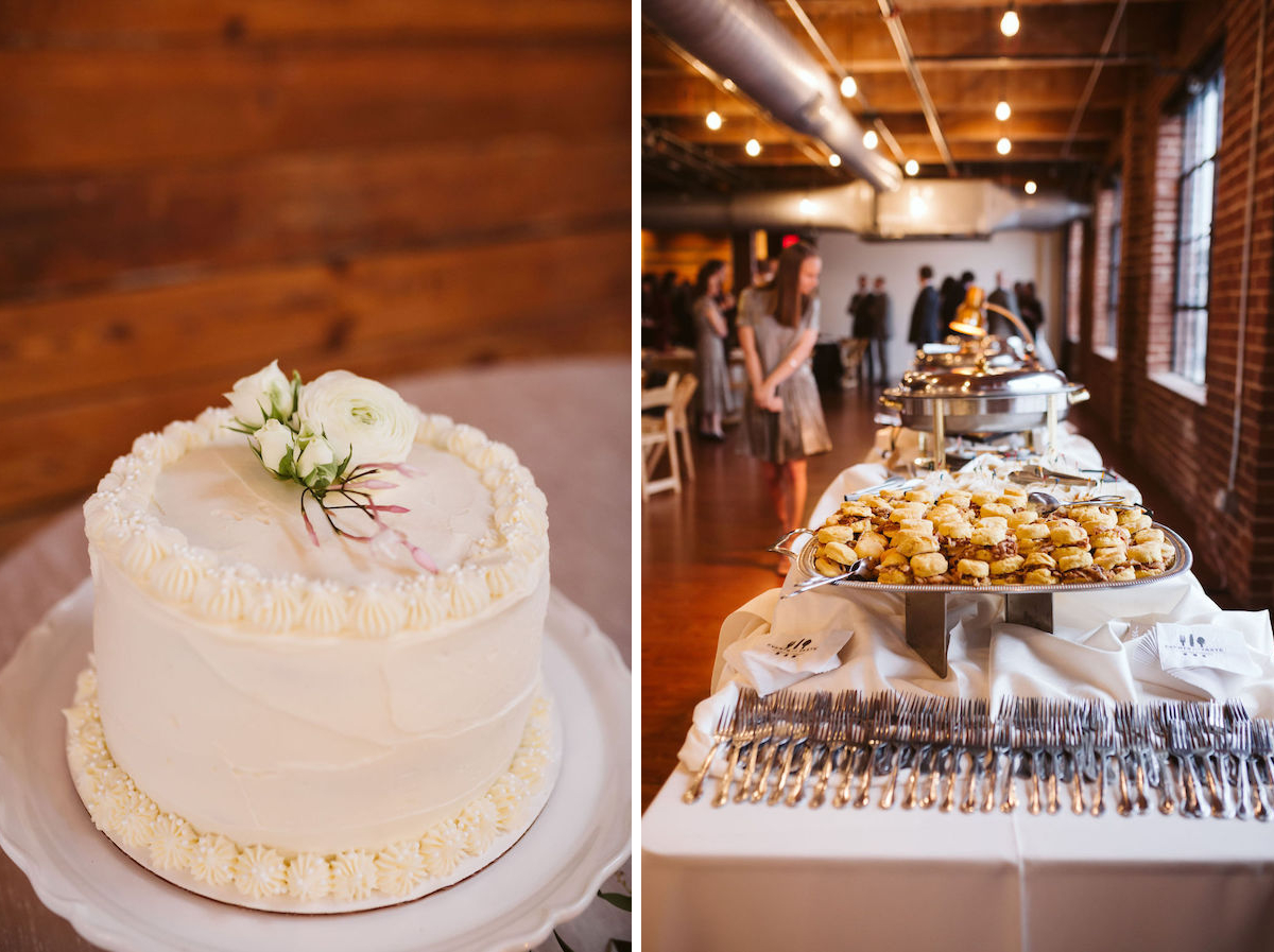 Forks and sandwich platter at front of long buffet table under tall windows and exposed brick walls of The Turnbull Building