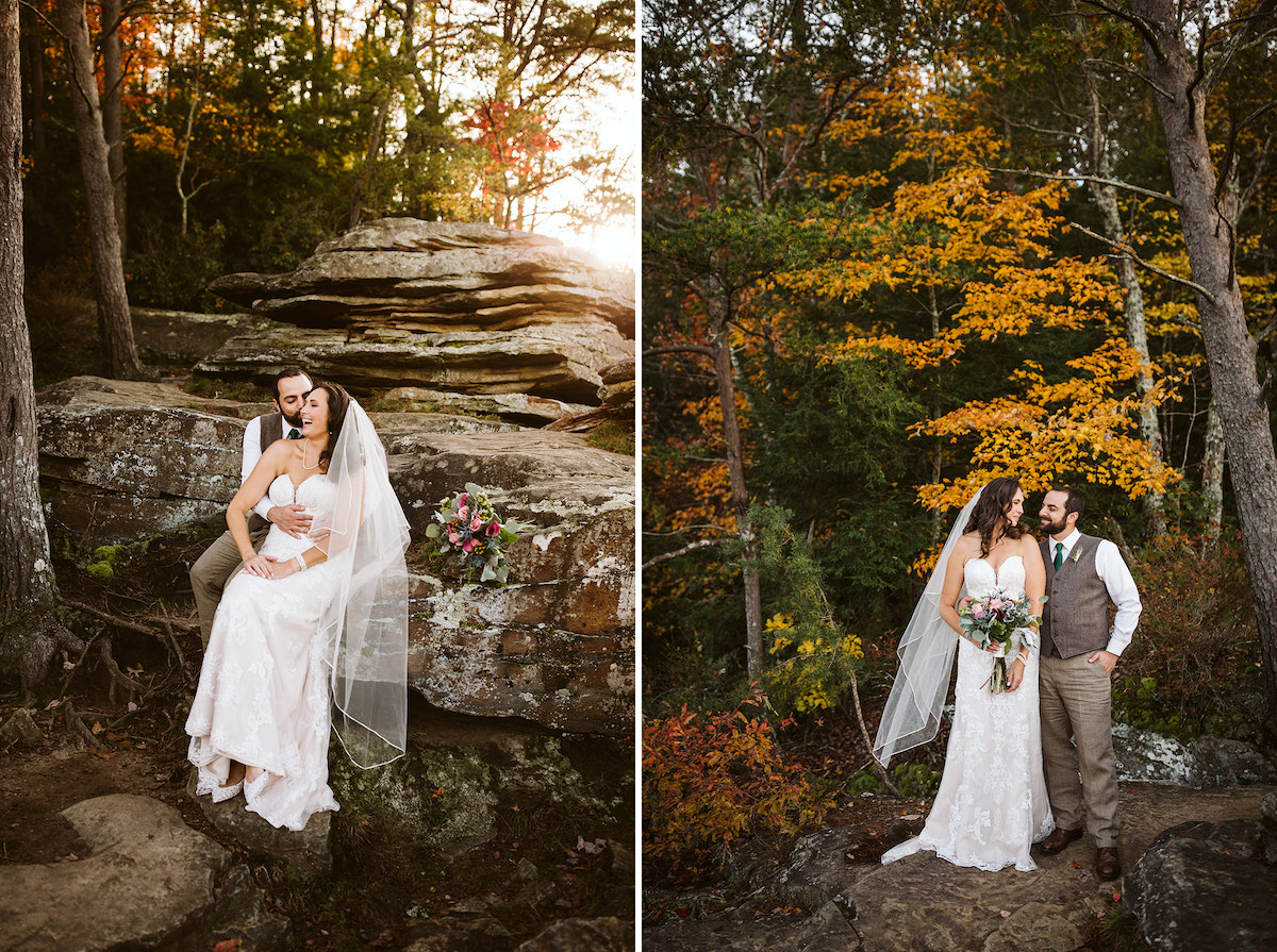 groom holds bride in front of large rocks and brightly colored autumn leaves at Fall Creek Falls State Park in Tennessee