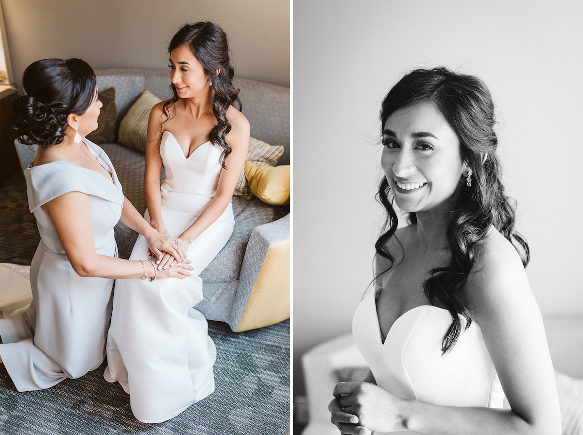 bride's mother kneels beside her as she sits on a loveseat