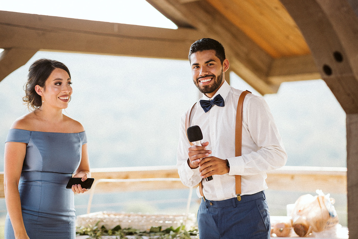 matron of honor and best man give toasts to the bride and groom