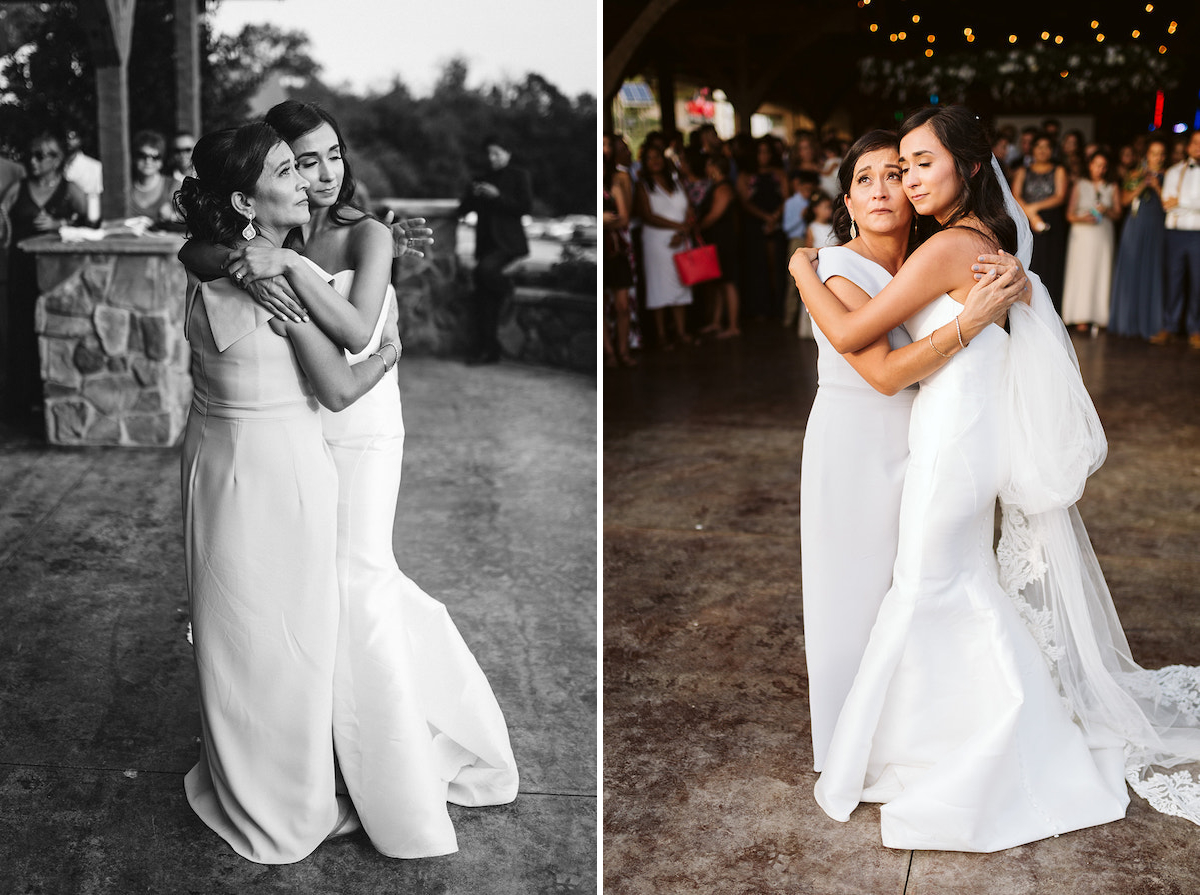 Bride and her mother hug and share a dance while wedding guests watch