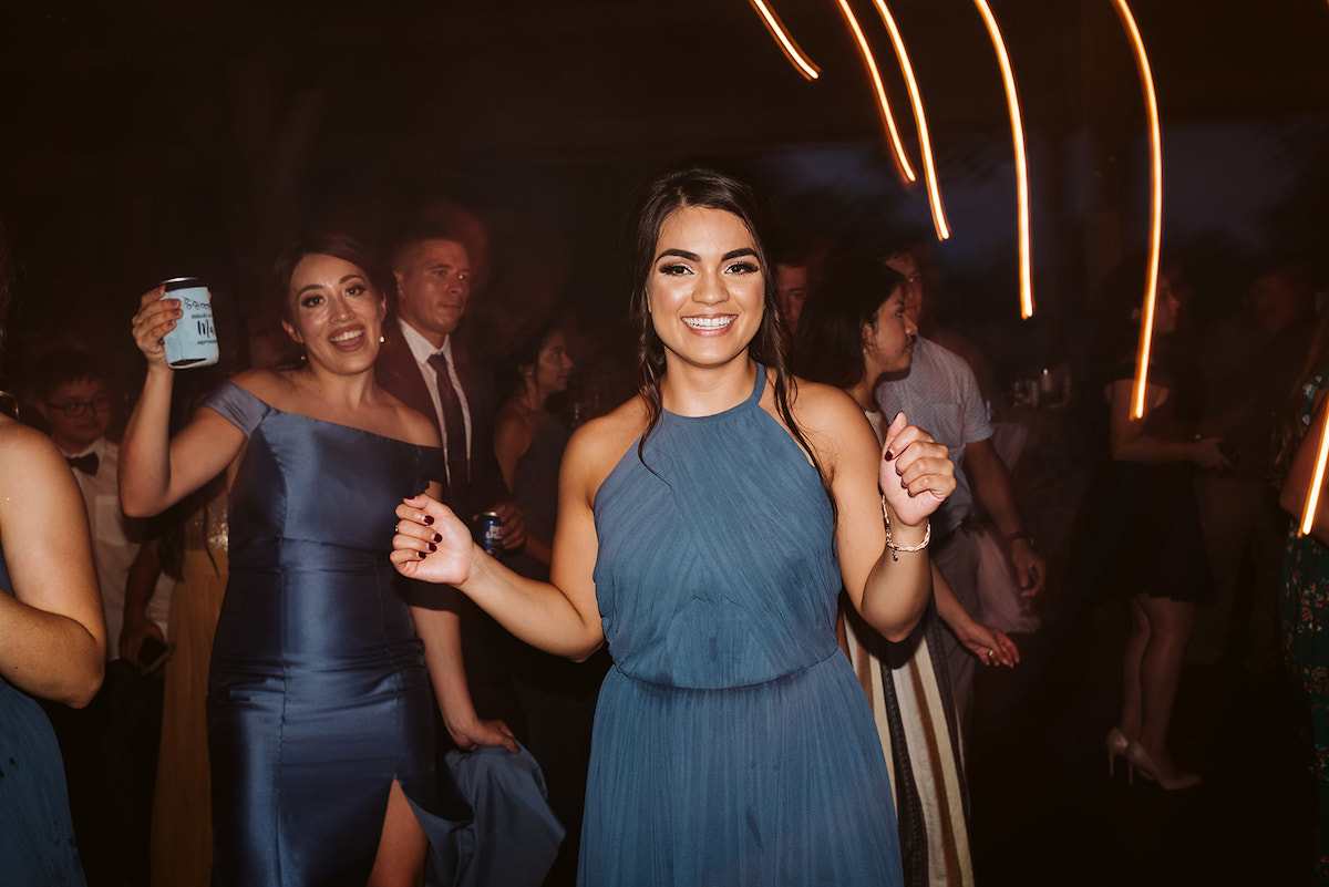 bridesmaids dancing during vineyard wedding reception