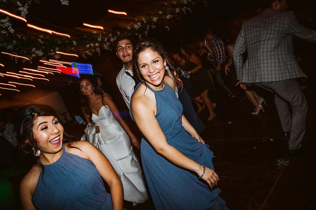 bridesmaids and bride dance at the wedding reception at DeBarge Vineyard