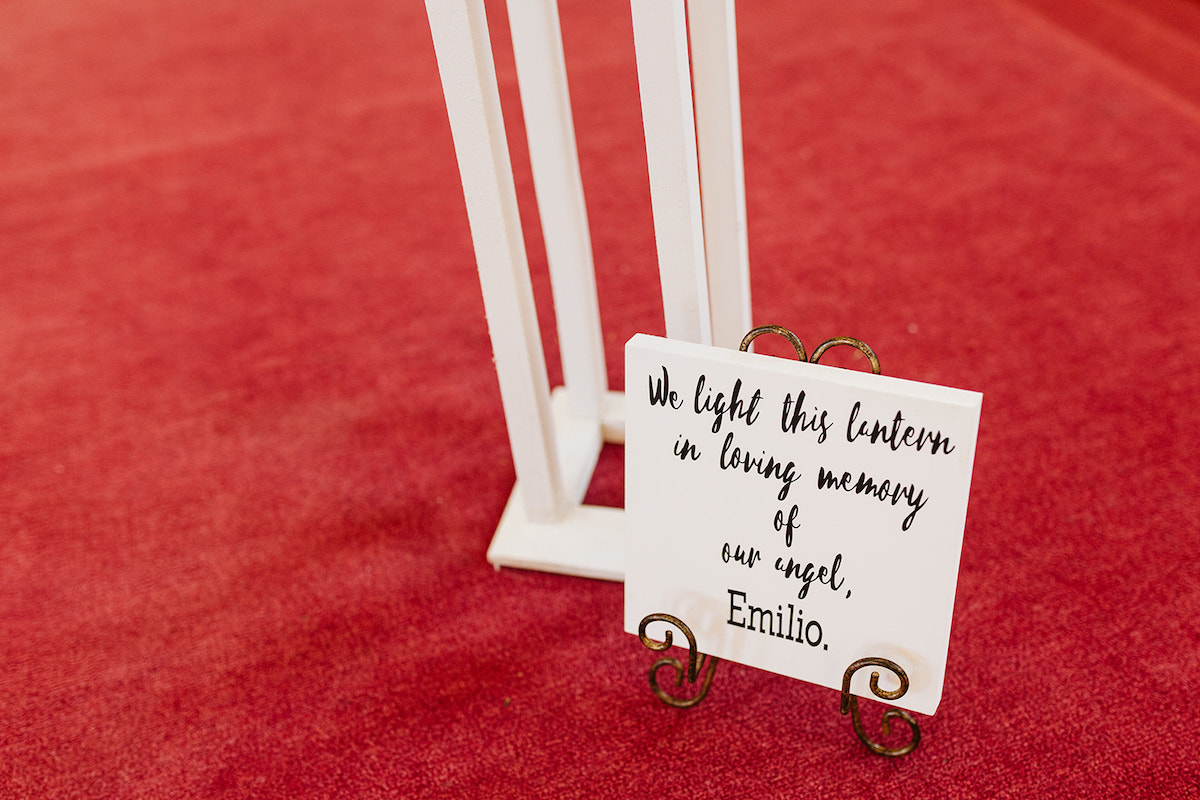 small sign of memorial on red carpet