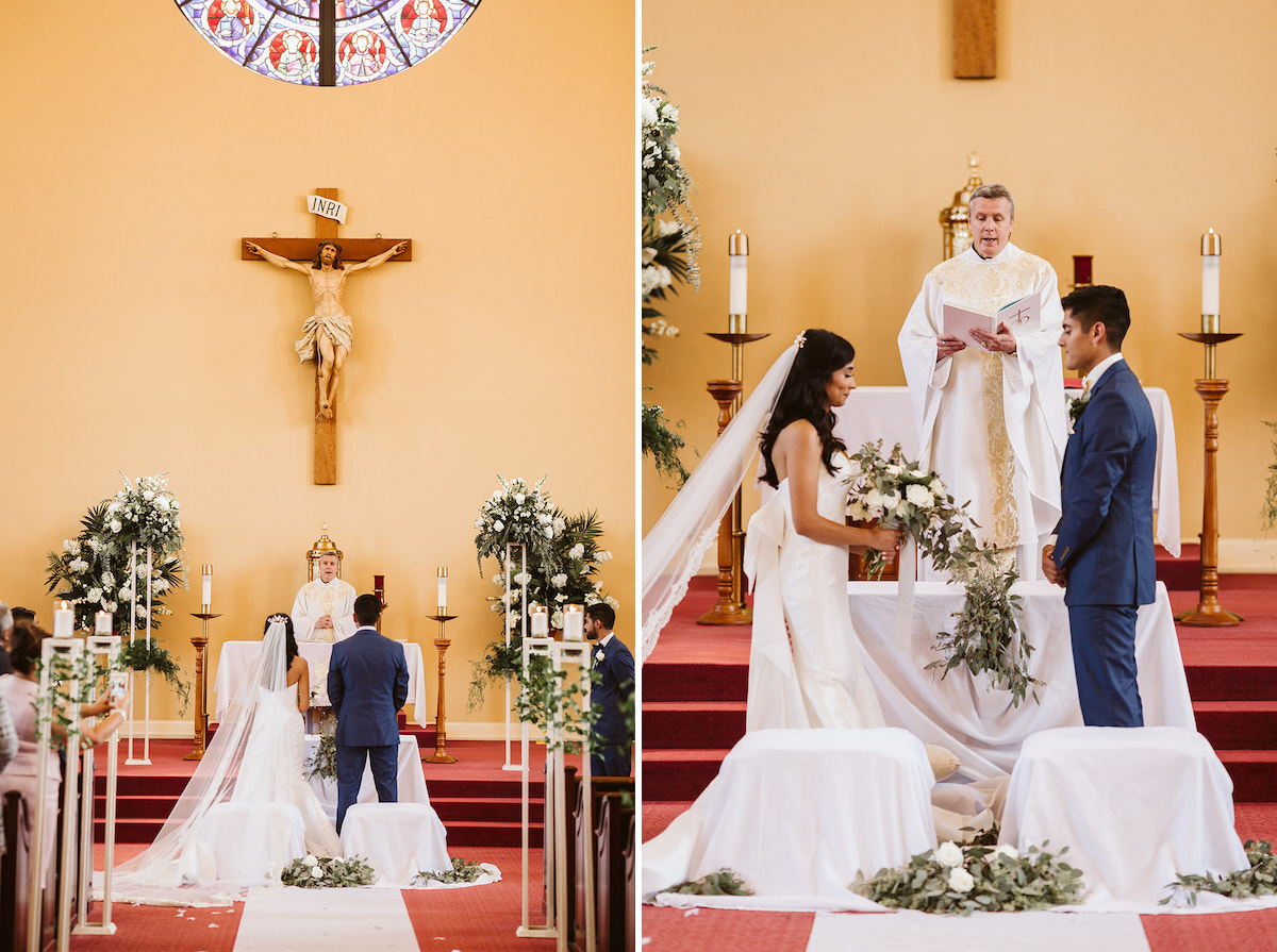 Bride and groom stand before priest at the altar of St Josephs Catholic Church in Dalton Georgia
