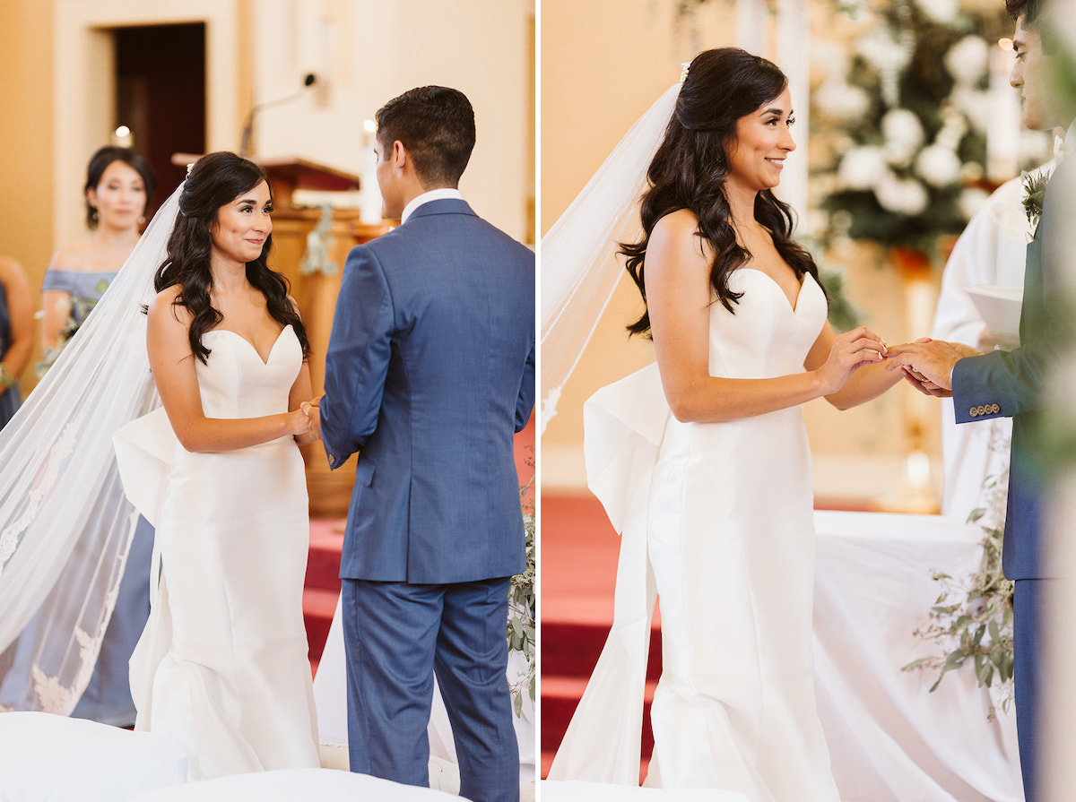 bride smiles at groom as she places wedding band on his finger