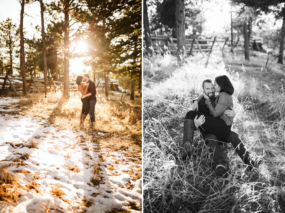 Man and woman stand in a tall grass field near snow. They hold hands and press their foreheads together as the sun sets