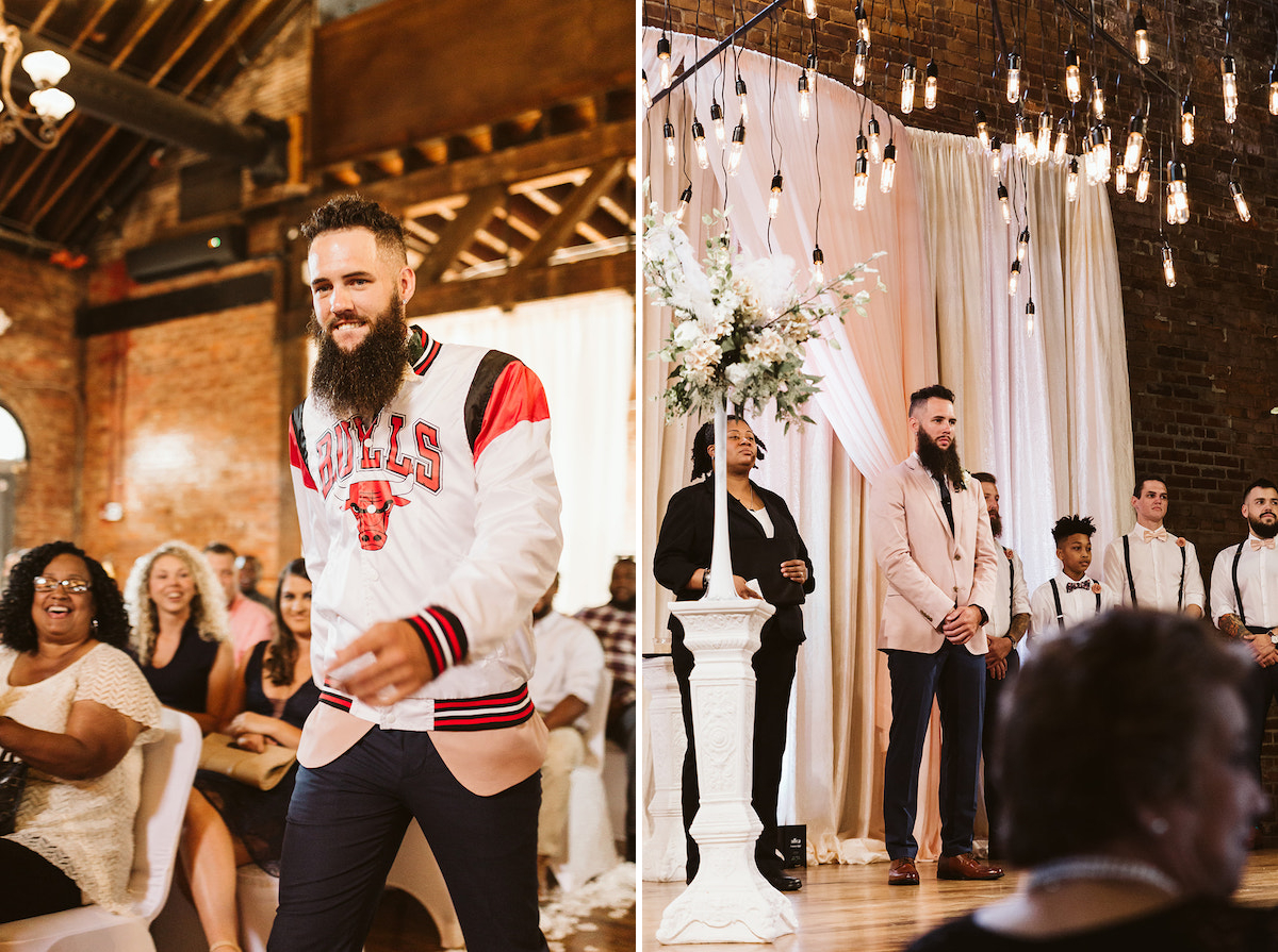 groom wears a Chicago Bulls basketball jacket over his suit coat as he walks the aisle at The Church on Main in Chattanooga