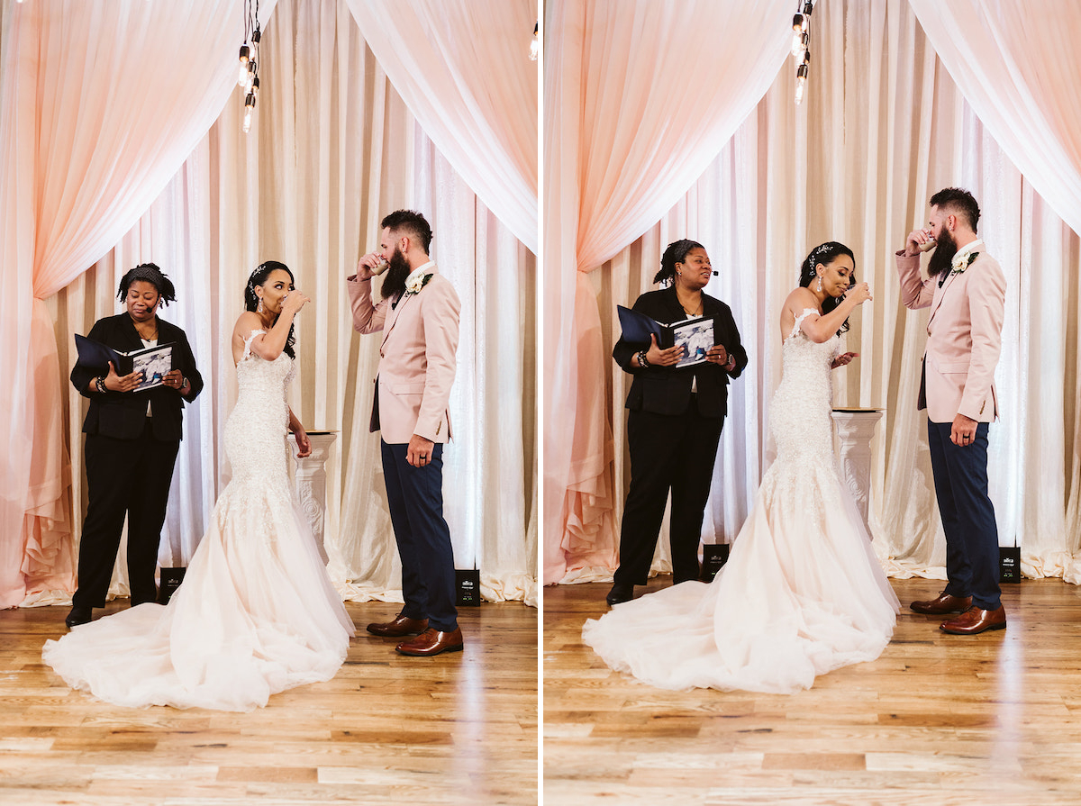 bride and groom toast each other while officiant presents reading