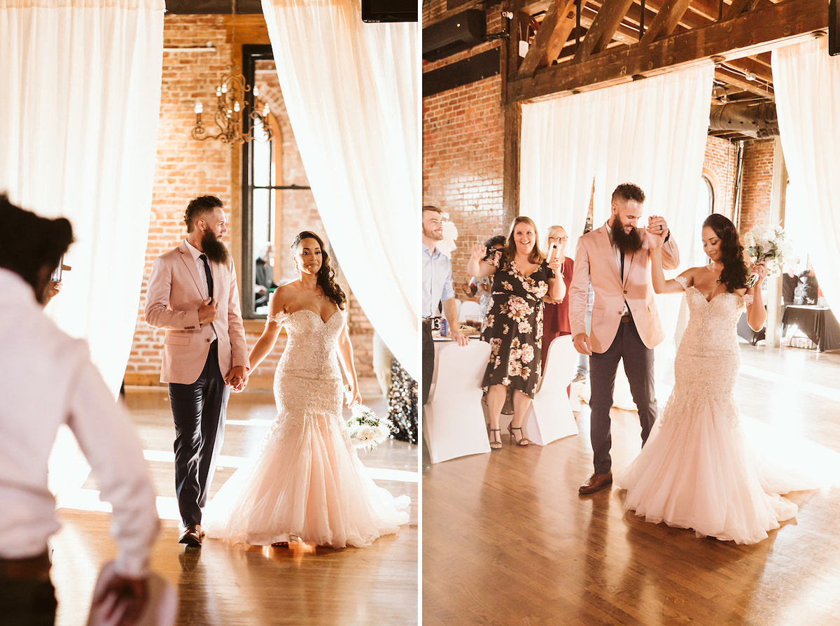 Bride and groom enter their Church on Main wedding reception through high, white curtains