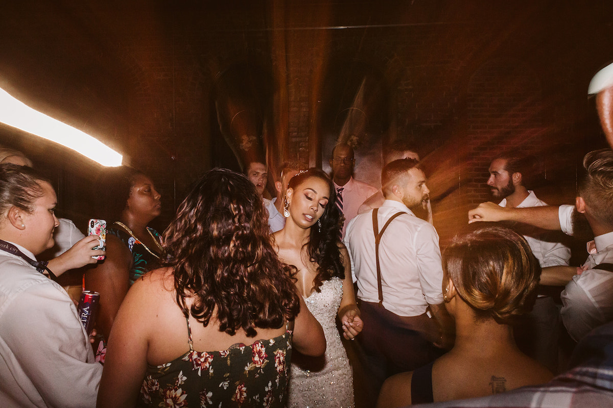 bride dances with friends