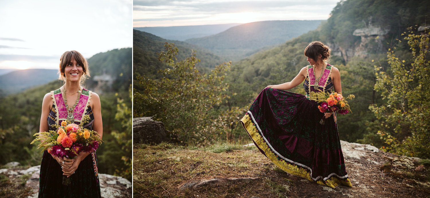 woman in colorful Bohemian wedding dress holds bright bouquet at overlook as Hemlock Falls wedding