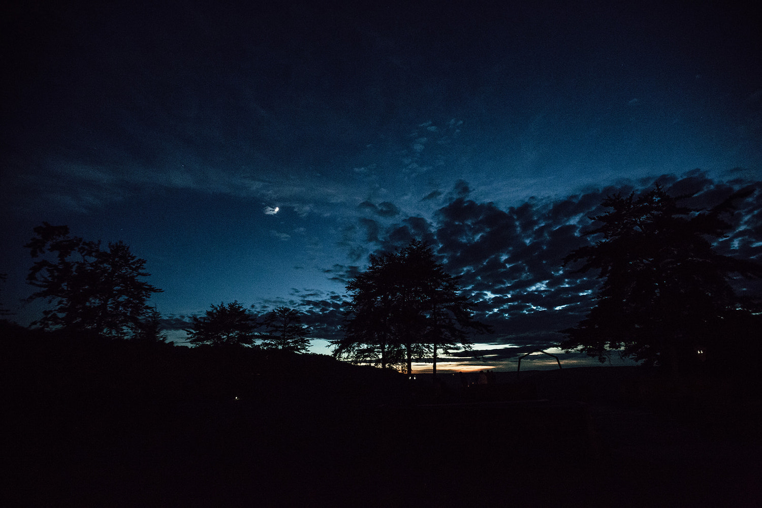 sunset and moonrise over Hemlock Falls wedding reception