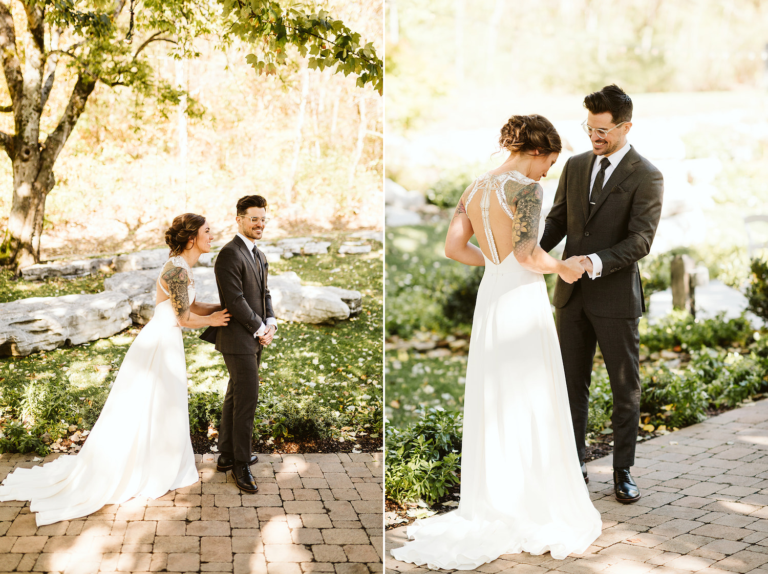 bride and groom share first look on a stone path under large trees