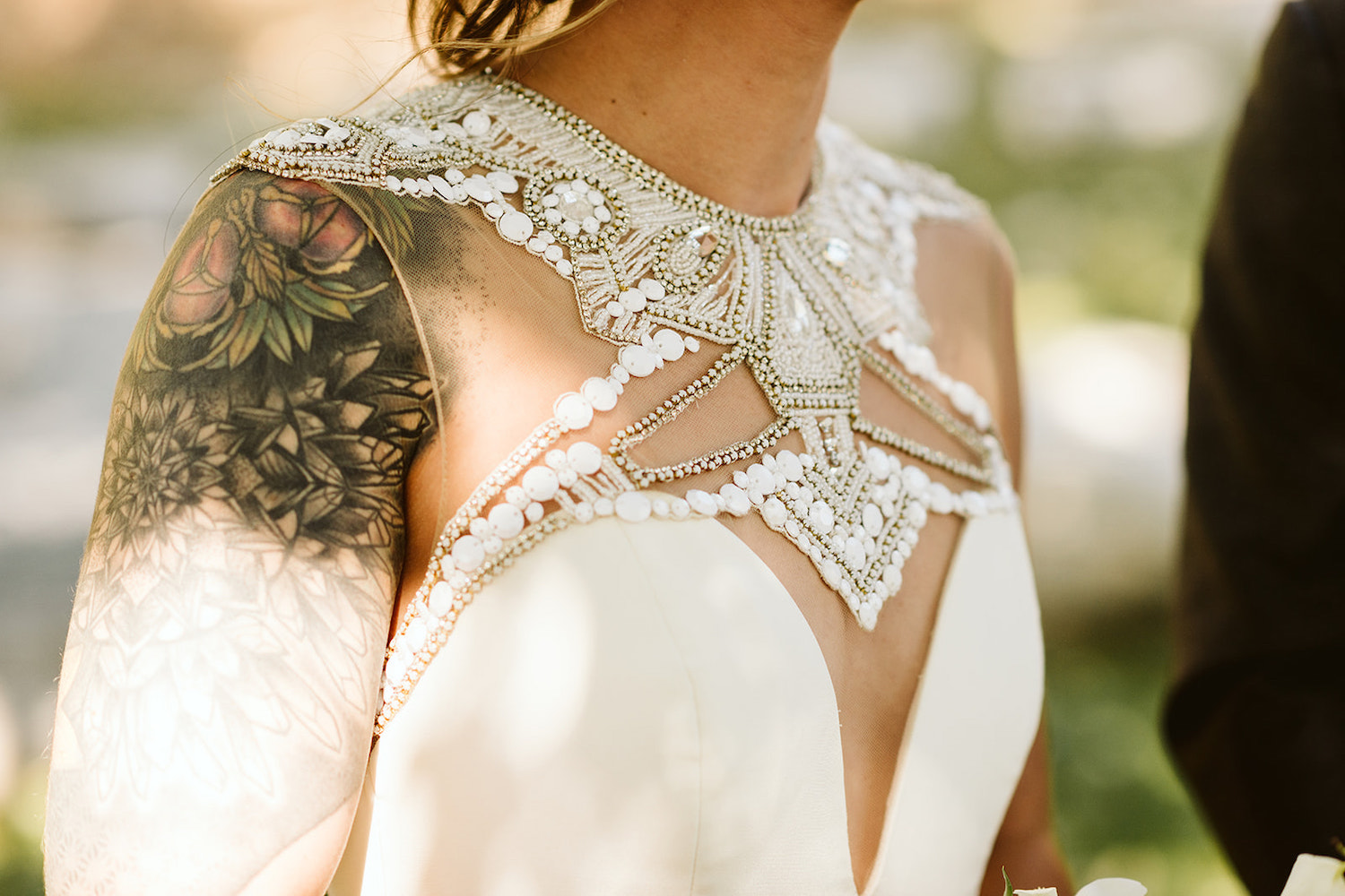 ornate jeweled details of bride's gowns bodice
