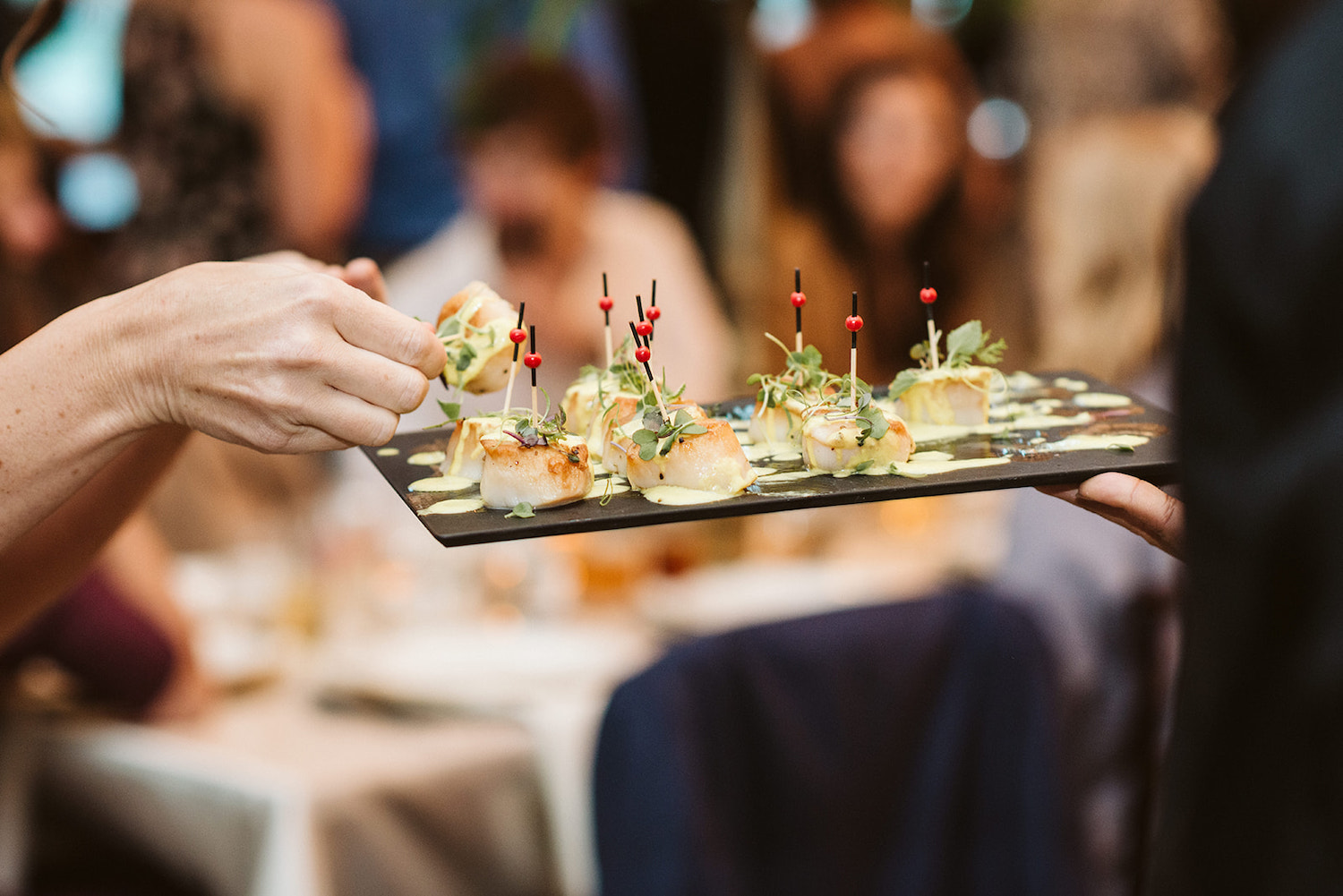 Events with Taste catering serves small scallop appetizer bites