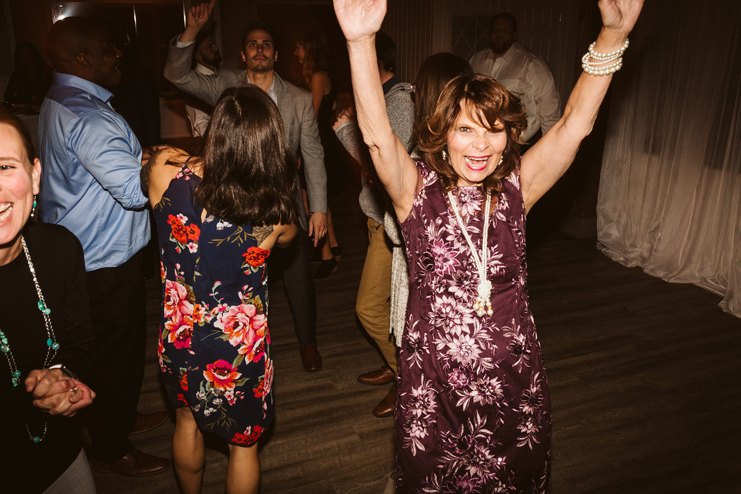 wedding guests dance in the dark dance floor