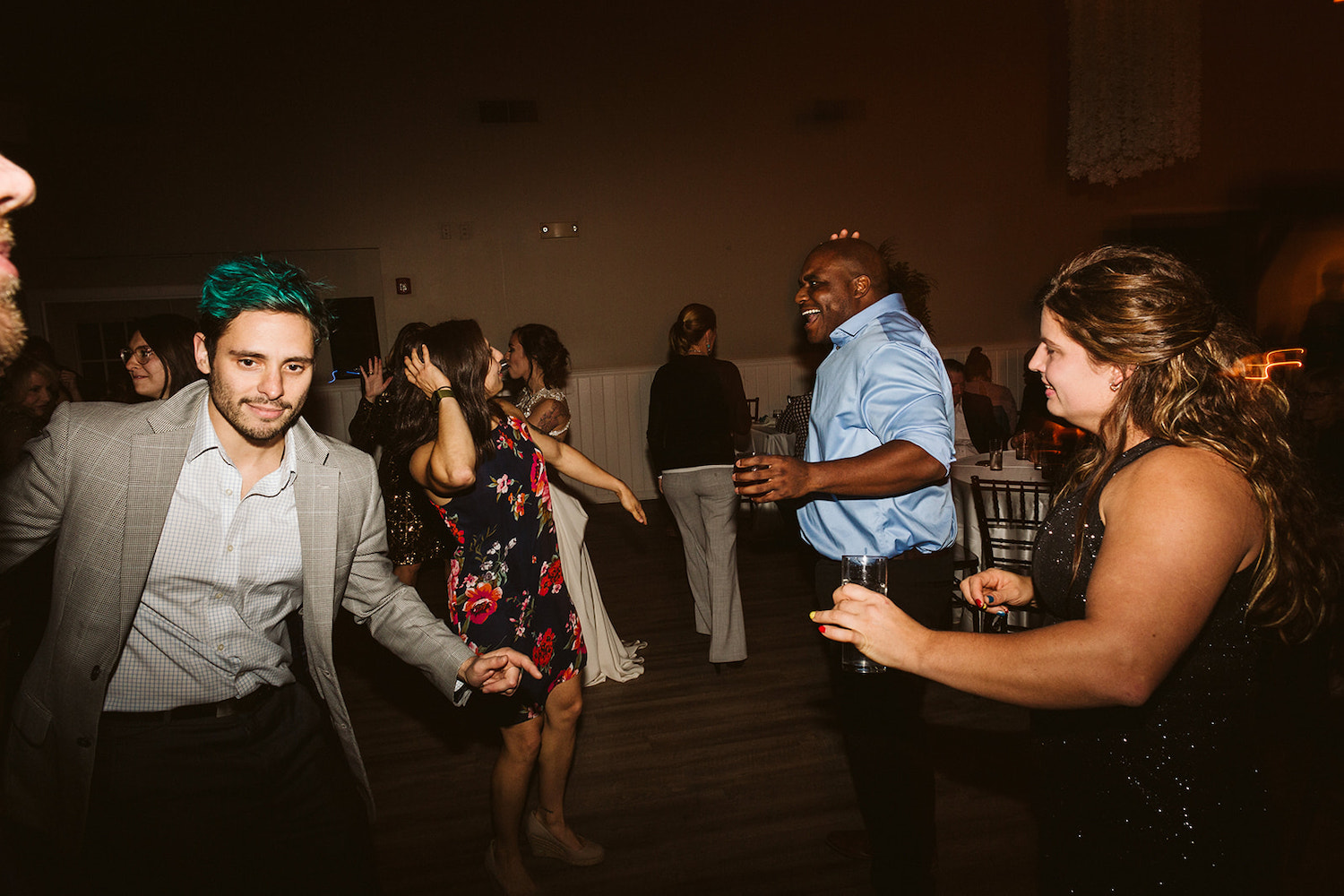 wedding guests dance in the dark dance floor