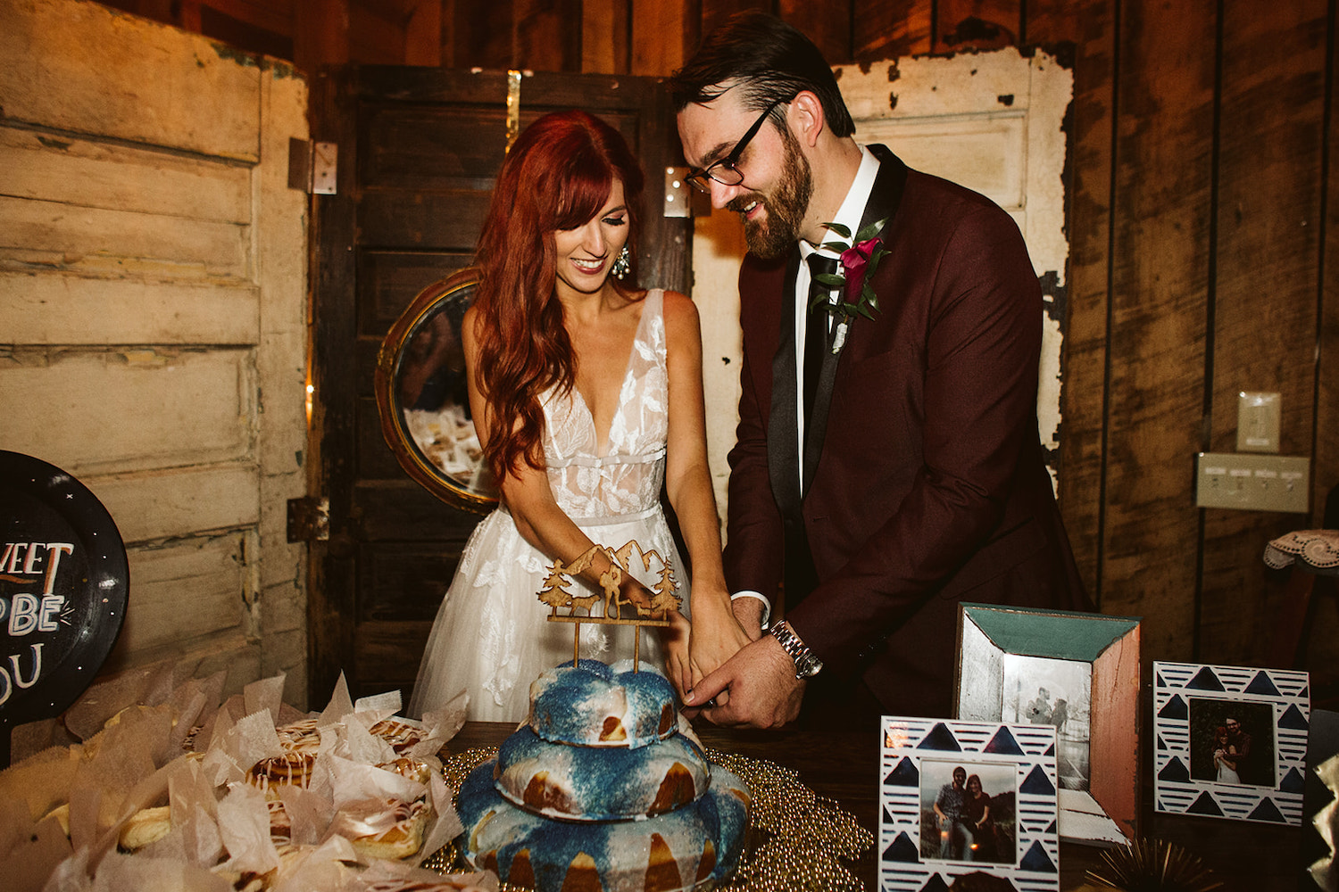 bride and groom cut their wedding cake