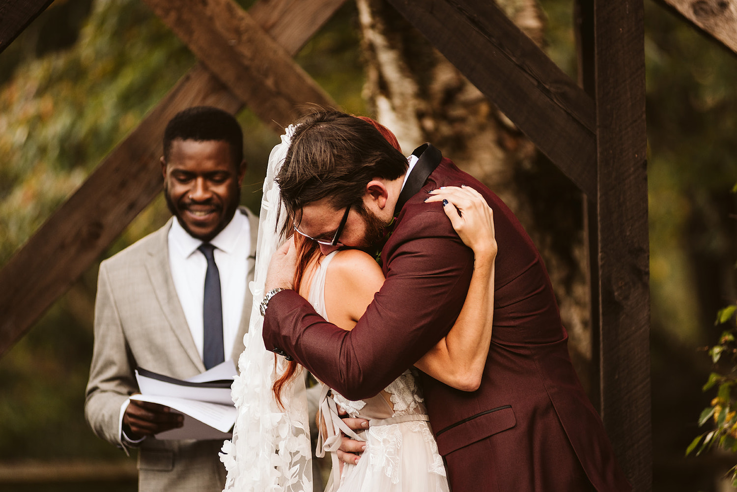 bride and groom hug tightly