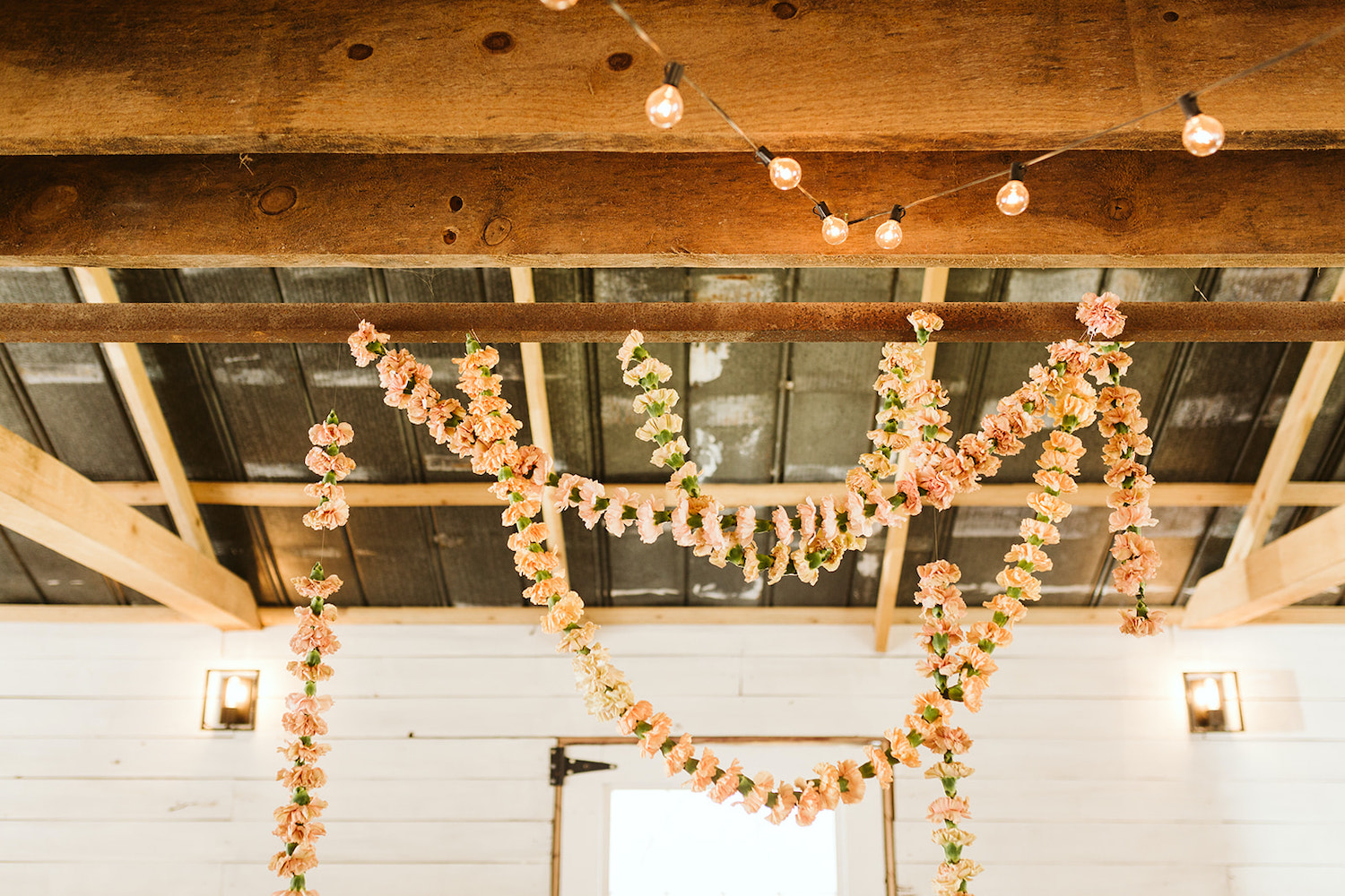 pink carnation garland strung from the rafters at Oakleaf Cottage on Lookout Mountain