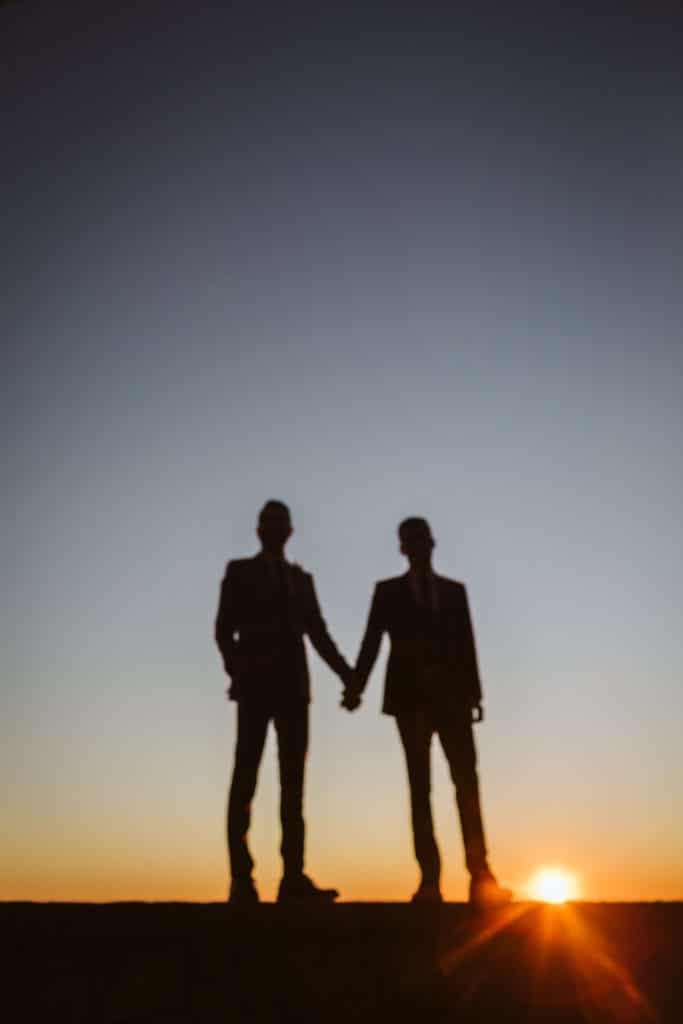 Golden hour newlywed portraits at Myers Point. Photo by OkCrowe Photography.