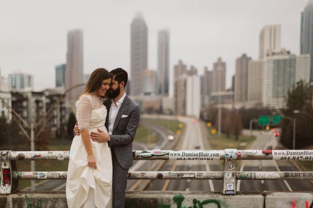 Urban engagement session by Jackson Street Bridge in Atlanta, Georgia. Photo by OkCrowe Photography.