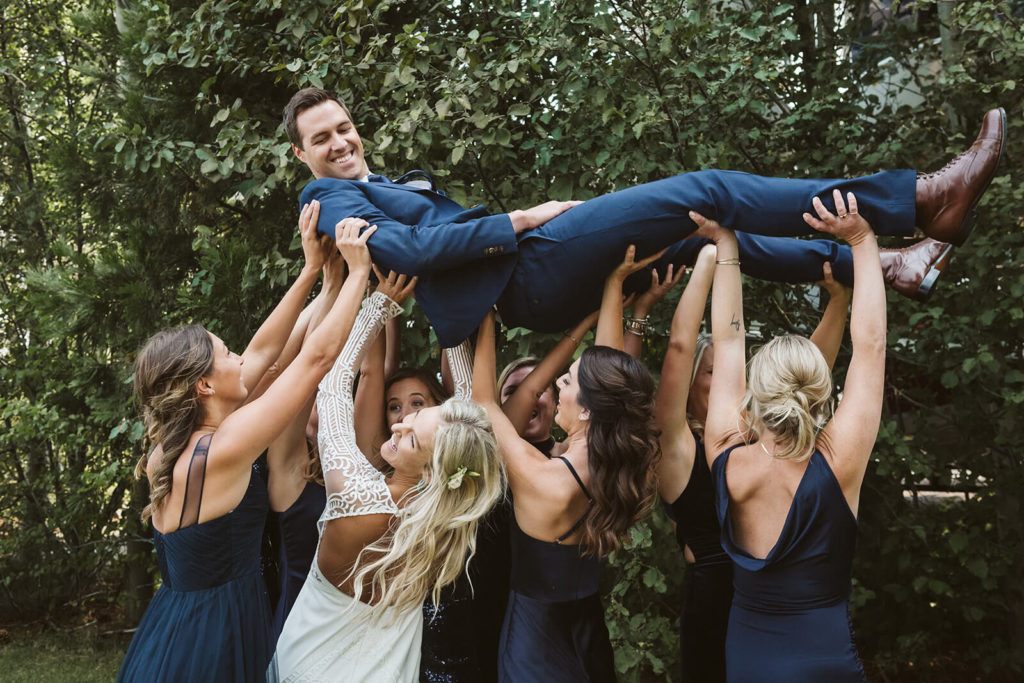 Wedding party portraits at the Westshore Cafe and Inn. Photo by OkCrowe Photography.