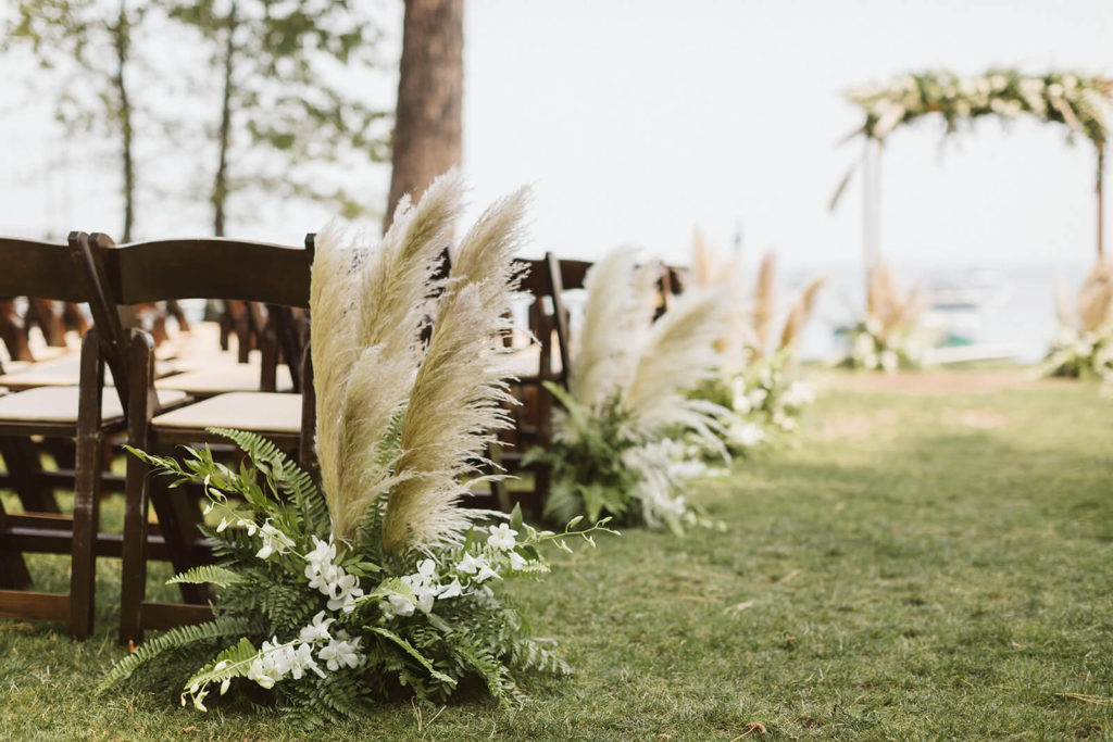 Lakeshore wedding at the Westshore Cafe and Inn. Photo by OkCrowe Photography.