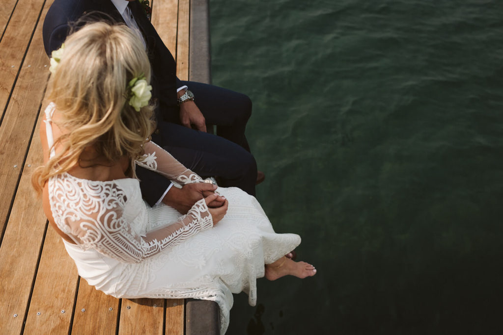 Bride and groom portraits at the Westshore Cafe and Inn. Photo by OkCrowe Photography.