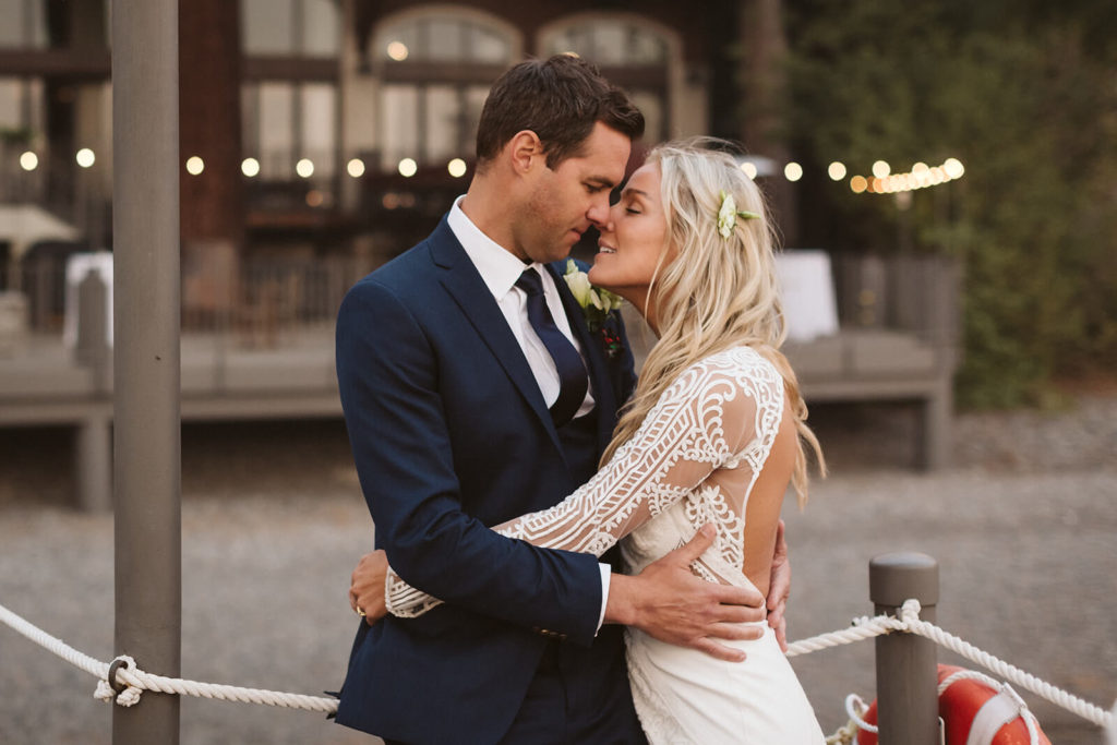 Bride and groom newlywed portraits at the Westshore Cafe and Inn. Photo by OkCrowe Photography.