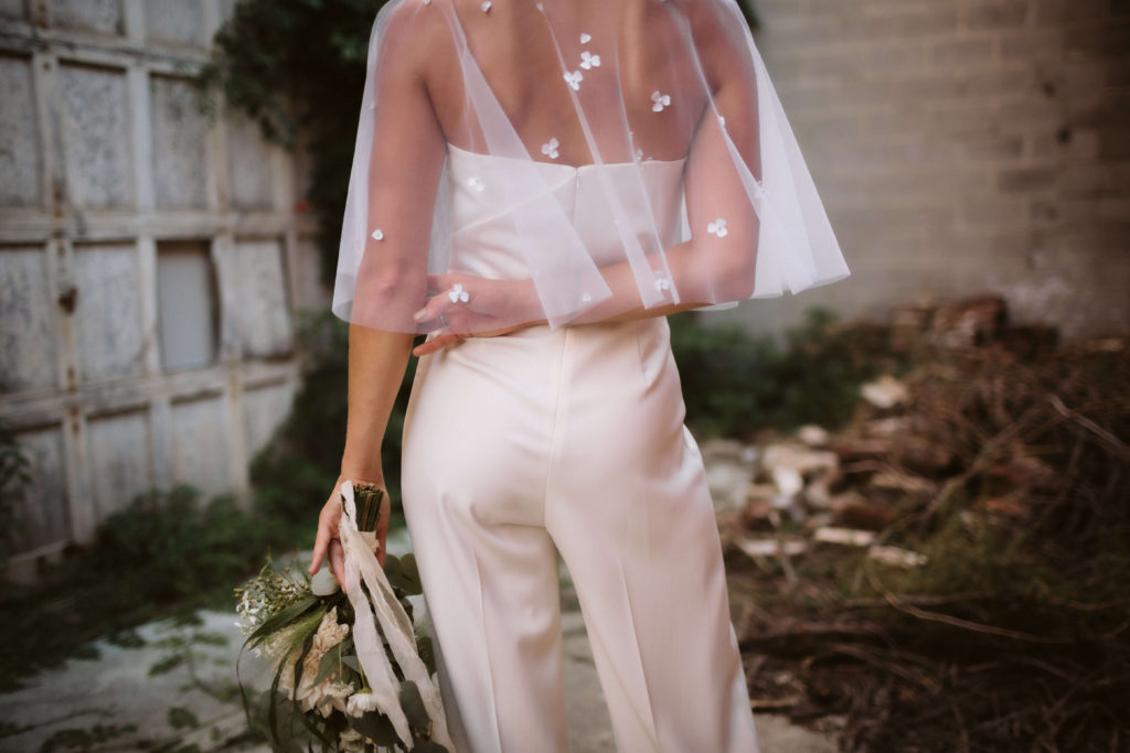 Newlywed portraits behind the Turnbull Building in Chattanooga. Photo by OkCrowe Photography.