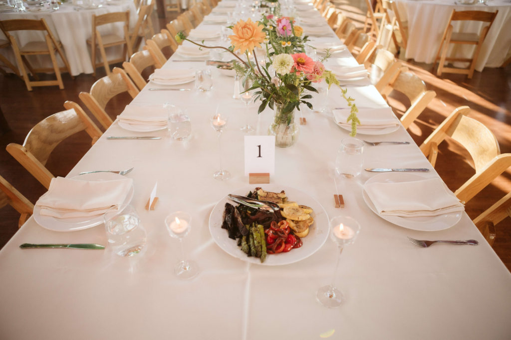 Colorful wedding decorations for a modern industrial wedding at the Turnbull Building in Chattanooga. Photo by OkCrowe Photography.