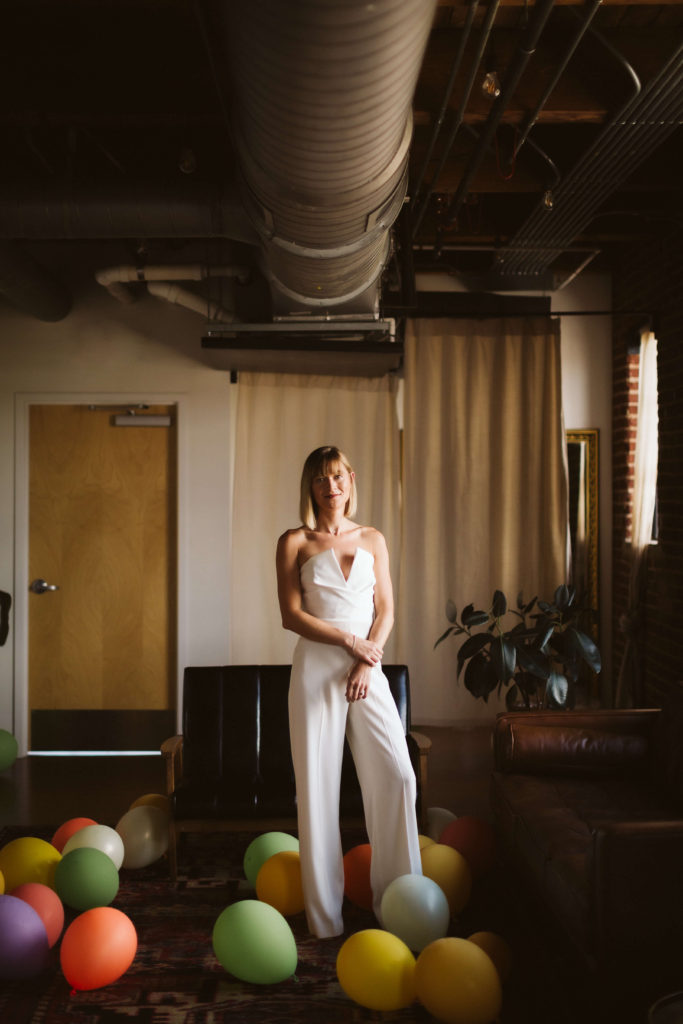 Bride and groom getting ready at the Turnbull Building in Chattanooga. Photo by OkCrowe Photography.