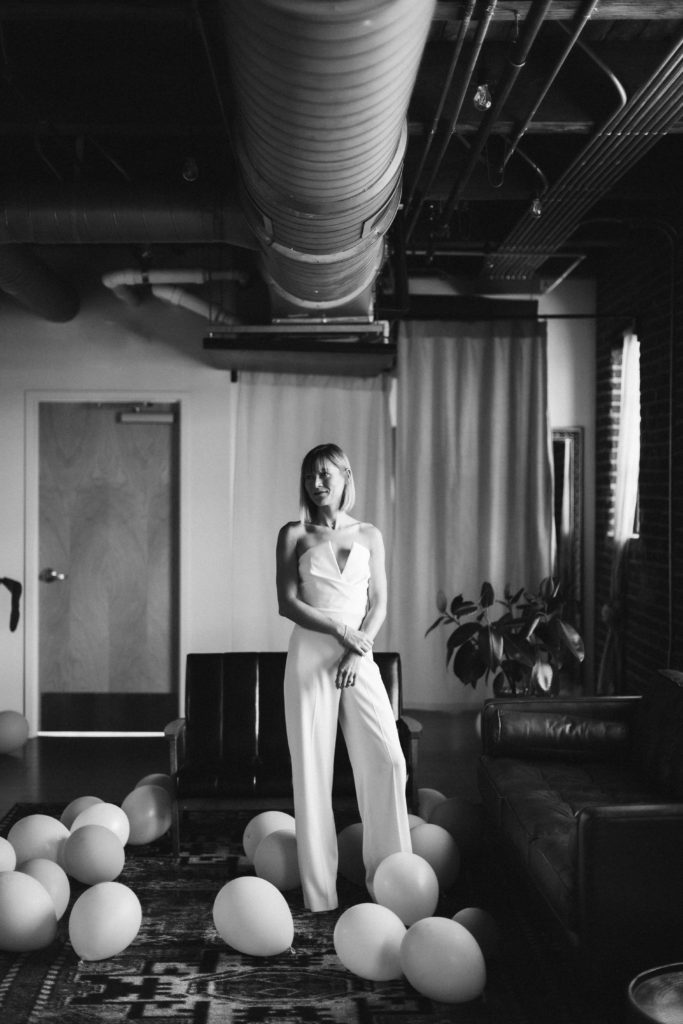 Bride and groom getting ready at the Turnbull Building in Chattanooga. Photo by OkCrowe Photography.