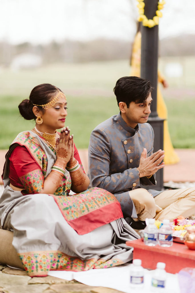 Praying during the Vidhi ceremony at the Tennessee Riverplace. Photo by OkCrowe Photography.